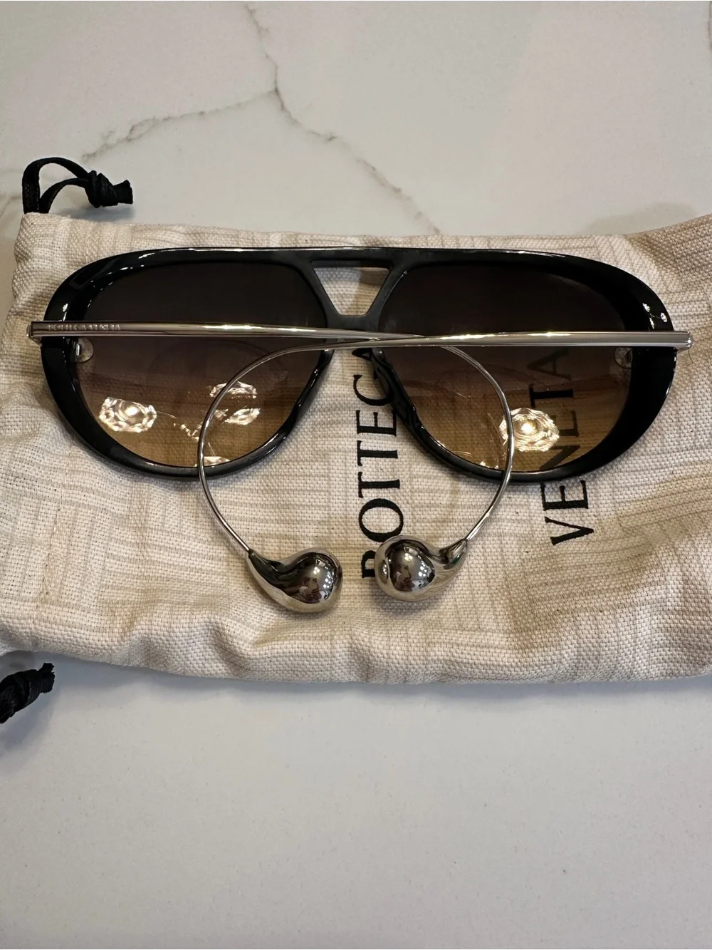 Bottega Veneta Black Sunglasses with Silver Metal Accents